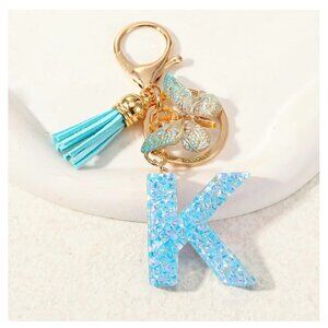 NWOT - Initial K Resin Charm Keychain - Light Blue Speckle with Butterfly and Ta